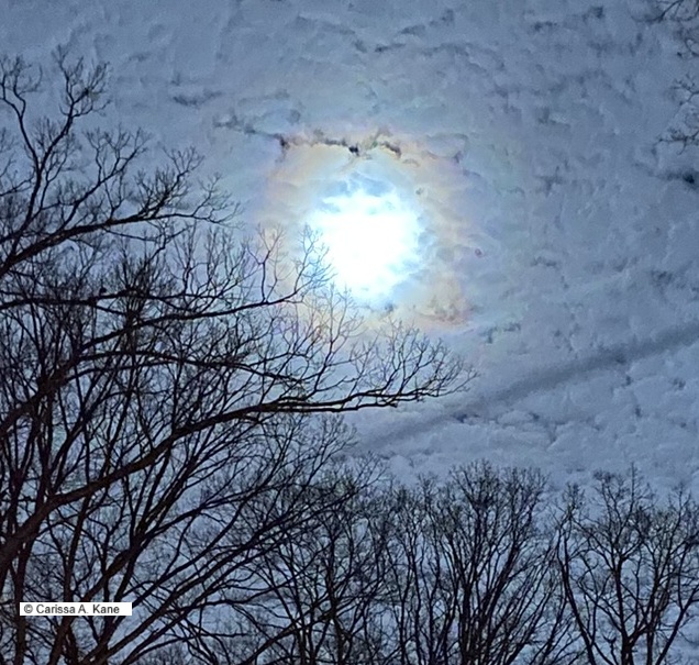 Moon with a rainbow around it