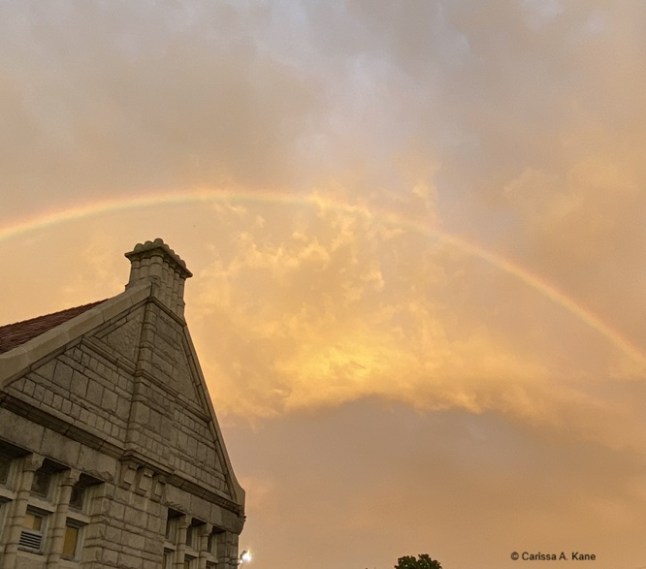 Rainbow over a building